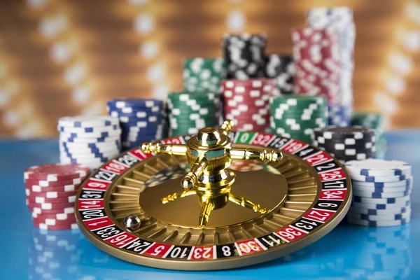 Our jitutoto live-dealer studio with roulette and baccarat tables